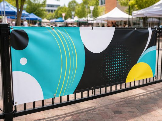 Grommeted custom vinyl banner installed at an outdoor event